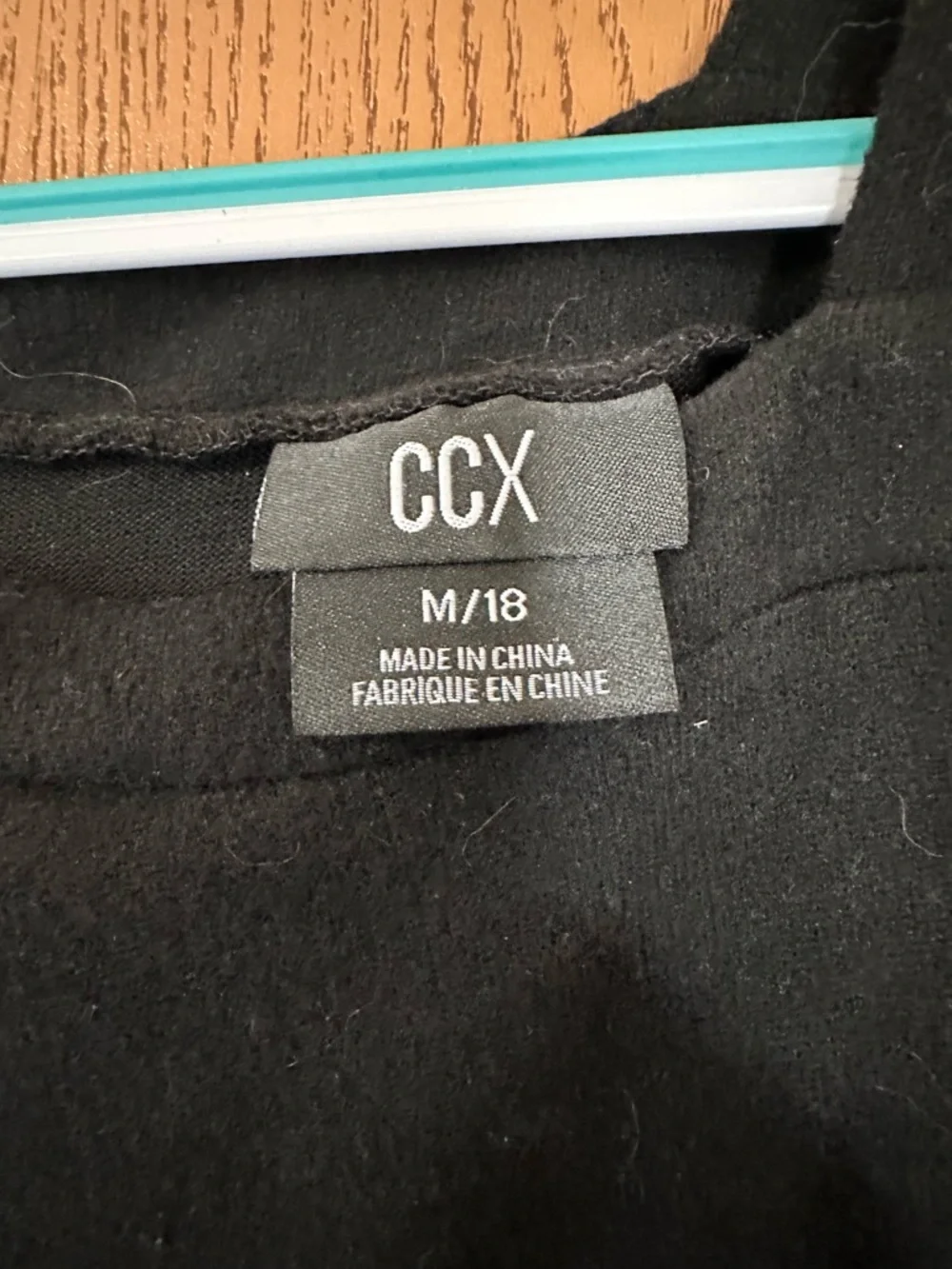 CHANEL Black One-Shoulder Sweatshirt with Strap Detail - Picture 3 of 4